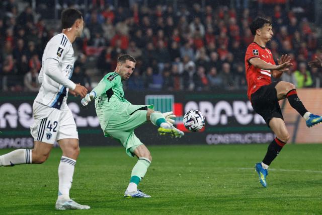 Paris FC's German goalkeeper #35 Kevin Trapp makes a clearance during the French L1 football match between Stade Rennais FC and Paris FC at the Roazhon Park stadium in Rennes, western France on May 10, 2026. (Photo by SIMON WOHLFAHRT / AFP)