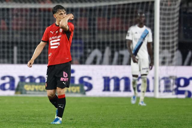 Rennes' French forward #09 Esteban Lepaul (L) celebrates after scoring his team's first goal during the French L1 football match between Stade Rennais FC and Paris FC at the Roazhon Park stadium in Rennes, western France on May 10, 2026. (Photo by SIMON WOHLFAHRT / AFP)