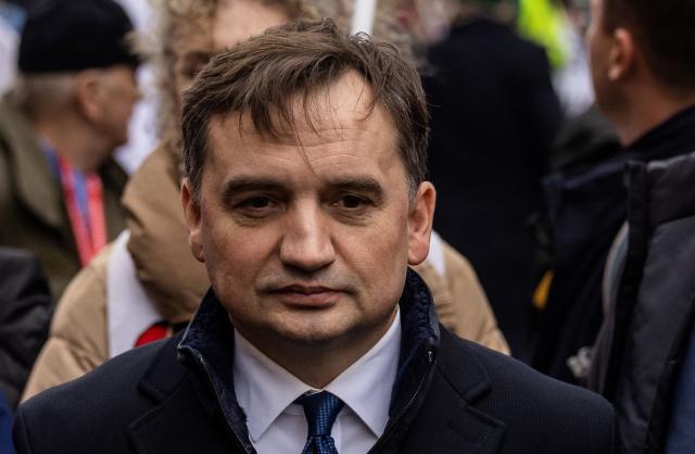 (FILES) This photograph shows then Polish Justice Minister Zbigniew Ziobro during an Independence Day march organised by nationalist groups in Warsaw on November 11, 2022. Poland's former justice minister Zbigniew Ziobro, wanted on several criminal charges in his home country has confirmed on May 10, 2026, that he has fled Hungary for the United States, following local media reports. (Photo by Wojtek RADWANSKI / AFP)