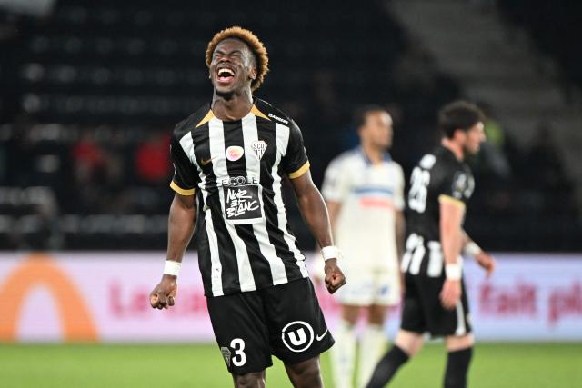 Angers' Gabonese defender #3 Jacques Ekomie reacts at the end of the French L1 football match between SCO Angers and RC Strasbourg Alsace (RCSA) at the Stade Raymond-Kopa in Angers on Mayh 10, 2026. (Photo by Sebastien Salom-Gomis / AFP)