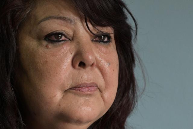 Isabel Diaz, a hantavirus survivor and daughter of Victor Diaz, who was identified by health authorities as patient zero in the 2018-2019 hantavirus outbreak that killed 11 people including her mother, gestures while speaking with AFP at her home in Epuyen, Chubut province, Argentina, on May 9, 2026. (Photo by JUAN MABROMATA / AFP)