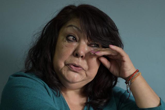 Isabel Diaz, a hantavirus survivor and daughter of Victor Diaz, who was identified by health authorities as patient zero in the 2018-2019 hantavirus outbreak that killed 11 people including her mother, gestures while speaking with AFP at her home in Epuyen, Chubut province, Argentina, on May 9, 2026. (Photo by JUAN MABROMATA / AFP)
