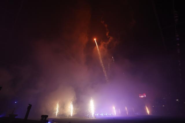 A firework launches into the sky before exploding at the end of the French L1 football match between Stade Rennais FC and Paris FC at the Roazhon Park stadium in Rennes, western France on May 10, 2026, as Rennes secured a top-five spot in the league marking their return to European competition next season. (Photo by SIMON WOHLFAHRT / AFP)