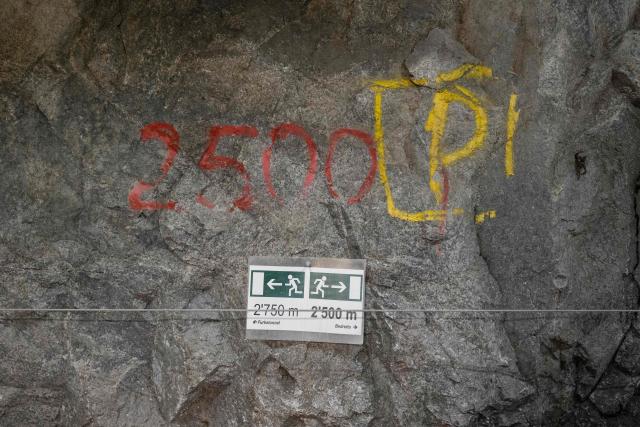 This photograph taken on April 29, 2026 shows an emergency exit into the tunnel to the BedrettoLab, a unique underground research facility operated by the Federal Institute of Technology Zurich (ETH Zurich) located 1500m beneath the Swiss Alps within a 5.2 km tunnel near Bedretto. Researchers have made the ground shake triggering thousands of tiny earthquakes in a monitored setting, as they seek to discover seismicity insights that can reduce risks. (Photo by Ennio LEANZA / AFP)