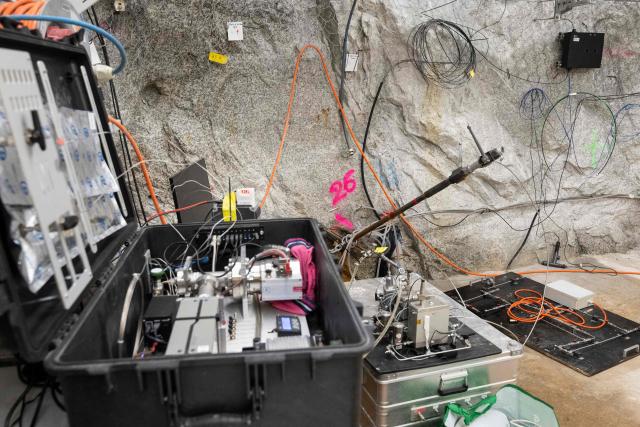 This photograph taken on April 29, 2026 shows measuring instruments in the BedrettoLab, a unique underground research facility operated by the Federal Institute of Technology Zurich, located 1500m beneath the Swiss Alps within a 5.2 km tunnel near Bedretto. Researchers have made the ground shake triggering thousands of tiny earthquakes in a monitored setting, as they seek to discover seismicity insights that can reduce risks. (Photo by Ennio LEANZA / AFP)