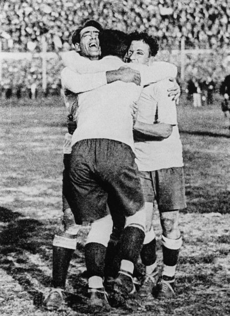(FILES) Uruguayans Pedro Cea, Hector Scarone and Hector Castro (from L) celebrate after Uruguay beat Argentina 4-2 in the first-ever World Cup soccer final in Montevideo on July 30, 1930. The FIFA World Cup, the most important and influential tournament, took its first steps on 21 May 1904, when the Federation Internationale de Football Association (FIFA) was founded in Paris by seven European countries. However, it would be more than a quarter of a century before the first edition of what is now known as the World Cup became a reality. The First World War (19141918) put a stop to plans for a global tournament.
Ten years later, the aspirations of the footballing community of that era came to fruition with the first World Cup in Uruguay. (Photo by AFP)