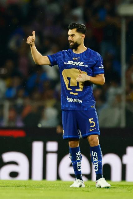 Pumas' Spanish defender #05 Ruben Duarte celebrates after scoring the opening goal during the Liga MX Clausura quarter-final second leg football match between Pumas and America at Olimpico Universitario stadium in Mexico City on May 10, 2026. (Photo by Rodrigo Oropeza / AFP)