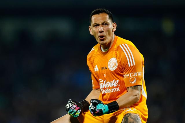 America's goalkeeper #30 Rodolfo Cota celebrates a goal later disallowed for offside after a VAR review during the Liga MX Clausura quarter-final second leg football match between Pumas and America at Olimpico Universitario stadium in Mexico City on May 10, 2026. (Photo by Rodrigo Oropeza / AFP)