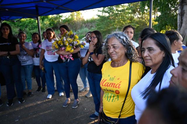 Women take part in a demonstration to demand the release of political prisoners on Mother's Day outside El Rodeo I prison in Guatire, Miranda state, Venezuela on May 10, 2026. (Photo by Juan BARRETO / AFP)