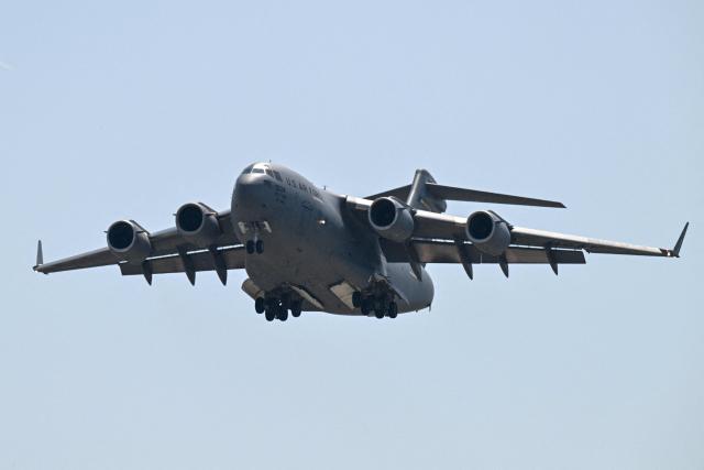 A US Air Force C-17 lands at Beijing Capital Airport in Beijing on May 11, 2026, ahead of a visit by U.S. President Donald Trump. President Donald Trump will visit China from May 13 to 15, with the US leader expected to discuss Iran and trade with his Chinese counterpart. (Photo by GREG BAKER / AFP)
