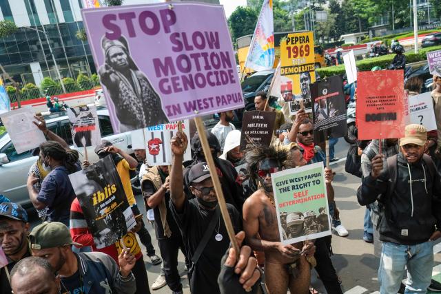 Papuan students take part in a protest demanding a thorough investigation into alleged human rights violations against local residents and calling for an end to military operations in Indonesia’s Papua region, in front of the Ministry of Law and Human Rights in Jakarta on May 11, 2026. (Photo by BAY ISMOYO / AFP)