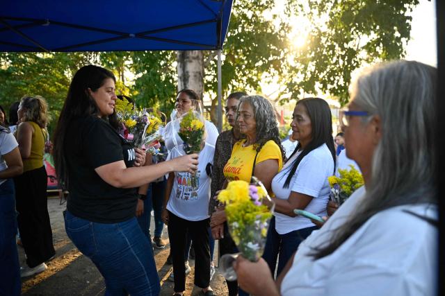 Women take part in a demonstration to demand the release of political prisoners on Mother's Day outside El Rodeo I prison in Guatire, Miranda state, Venezuela on May 10, 2026. (Photo by Juan BARRETO / AFP)