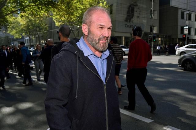 Abraham Abbas leaves Melbourne Magistrates court in Melbourne on May 11, 2026, after attending a hearing where his sister Kawsar Ahmad and her daughter Zeinab appeared following their arrest on May 7 in Melbourne upon their return from Syria. Kawsar and Zeinab allegedly committed crimes against humanity while supporting Islamic State jihadists in Syria. The women returned to Australia after years spent in a Syrian detention camp, where they were stranded after Islamic State's collapse. (Photo by William WEST / AFP)