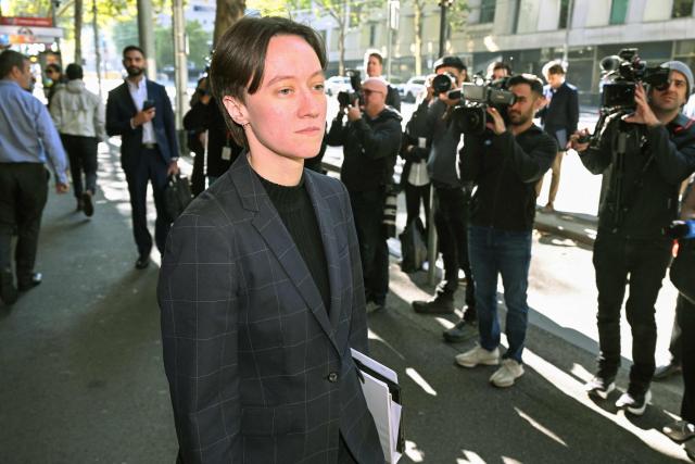 Lawyer Maya George (L), representing Zeinab Ahmad, leaves Melbourne Magistrates' Court in Melbourne on May 11, 2026, after attending a hearing where Zeinab and her mother Kawsar Ahmad appeared following their arrest on May 7 in Melbourne upon their return from Syria. Kawsar and Zeinab allegedly committed crimes against humanity while supporting Islamic State jihadists in Syria. The women returned to Australia after years spent in a Syrian detention camp, where they were stranded after Islamic State's collapse. (Photo by William WEST / AFP)
