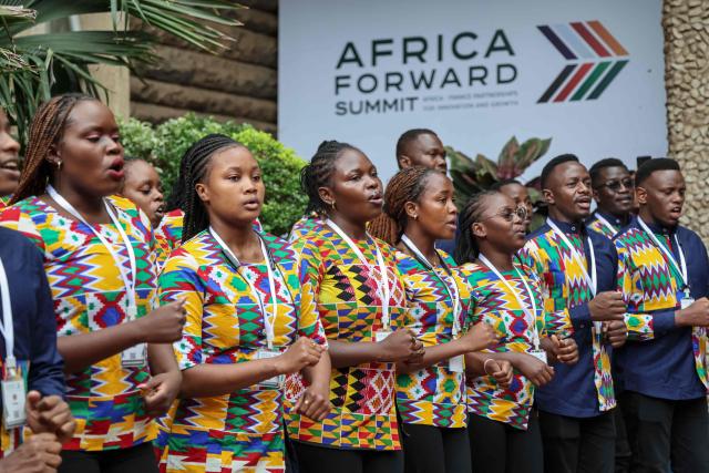 A choir sings as delegates arrive at the Africa Forward summit in Nairobi on May 11, 2026. (Photo by Ludovic MARIN / AFP)
