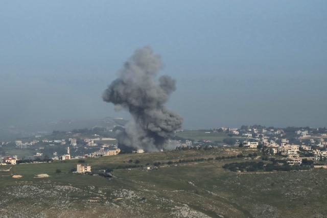 A photograph taken from the southern Lebanese area of Marjeyoun shows smoke as it rises from the site of an Israeli airstrike that targeted the village of Kfar Tibnit on May 11, 2026. Lebanon was drawn into the Middle East war on March 2 when Tehran-backed militant group Hezbollah launched attacks on Israel to avenge the killing of the Iranian leader. Israel has responded with broad strikes across Lebanon and a ground offensive. Lebanon's health ministry on May 10, 2026, raised the overall death toll from Israeli strikes since war erupted to 2,846 killed, including 108 health and emergency workers. (Photo by AFP)