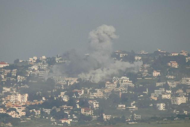 A photograph taken from the southern Lebanese area of Marjeyoun shows smoke as it rises from the site of an Israeli airstrike that targeted the village of Mayfadoun on May 11, 2026. on May 11, 2026. Lebanon was drawn into the Middle East war on March 2 when Tehran-backed militant group Hezbollah launched attacks on Israel to avenge the killing of the Iranian leader. Israel has responded with broad strikes across Lebanon and a ground offensive. Lebanon's health ministry on May 10, 2026, raised the overall death toll from Israeli strikes since war erupted to 2,846 killed, including 108 health and emergency workers. (Photo by AFP)
