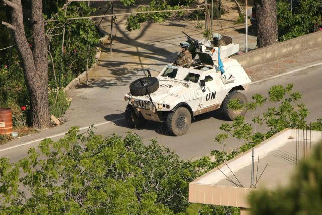 An United Nations Interim Force in Lebanon (UNIFIL) armoured vehicle armored vehicle patrols the southern Lebanese border area of Marjayoun on May 11, 2026. Lebanon was drawn into the Middle East war on March 2 when Tehran-backed militant group Hezbollah launched attacks on Israel to avenge the killing of the Iranian leader. Israel has responded with broad strikes across Lebanon and a ground offensive. Lebanon's health ministry on May 10, 2026, raised the overall death toll from Israeli strikes since war erupted to 2,846 killed, including 108 health and emergency workers. (Photo by AFP)