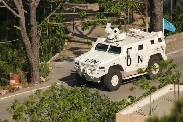 An United Nations Interim Force in Lebanon (UNIFIL) armoured vehicle armored vehicle patrols the southern Lebanese border area of Marjayoun on May 11, 2026. Lebanon was drawn into the Middle East war on March 2 when Tehran-backed militant group Hezbollah launched attacks on Israel to avenge the killing of the Iranian leader. Israel has responded with broad strikes across Lebanon and a ground offensive. Lebanon's health ministry on May 10, 2026, raised the overall death toll from Israeli strikes since war erupted to 2,846 killed, including 108 health and emergency workers. (Photo by AFP)