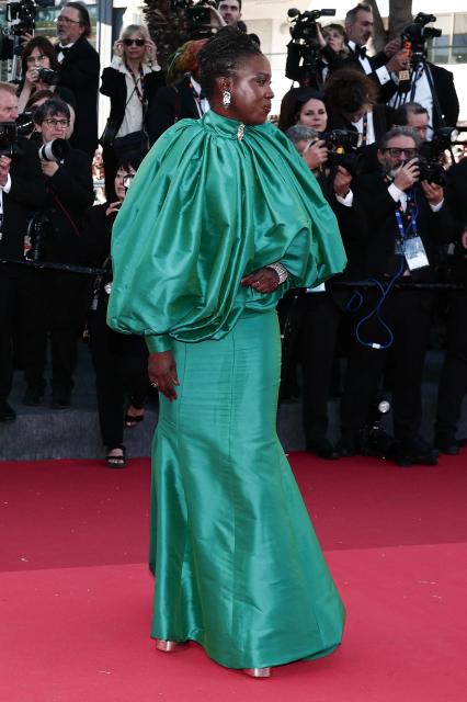 Senegalese director and screenwriter Angele Diabang arrives for the Opening Ceremony and the screening of the film "La Venus electrique" (The Electric Kiss) at the 79th edition of the Cannes Film Festival in Cannes, southern France, on May 12, 2026. (Photo by Thibaud MORITZ / AFP)