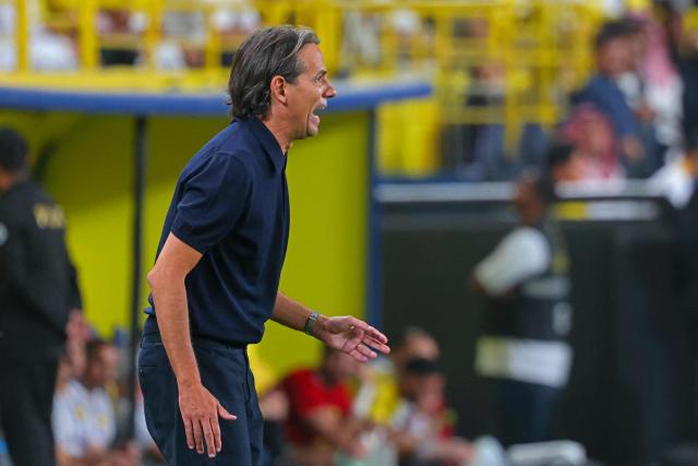 Al-Hilal Italian coach Simone Inzaghi reacts during the Saudi Pro League football match between Al-Nassr and Al-Hilal at King Fahd Sports City Stadium in Riyadh on May 12, 2026. (Photo by Fayez NURELDINE / AFP)