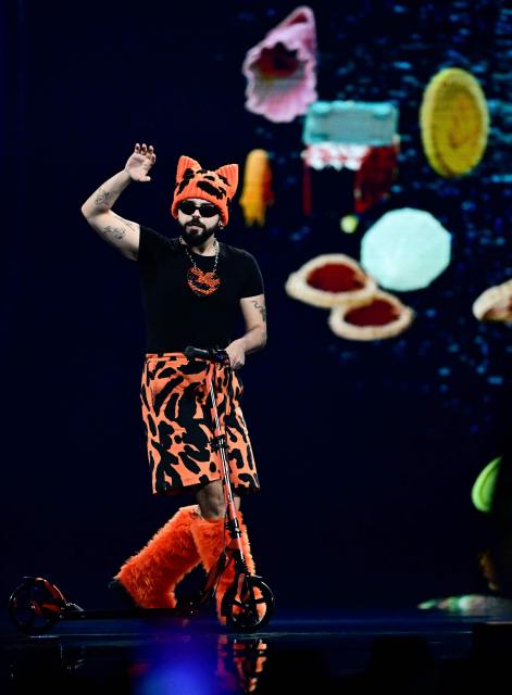 Greek singer Akylas Mytilinaios, aka Akylas and representing Greece with the song 'Ferto', performs during the first semi-final of the Eurovision Song Contest 2026 (ESC) at Wiener Stadthalle in Vienna, Austria on May 12, 2026. (Photo by Tobias SCHWARZ / AFP)