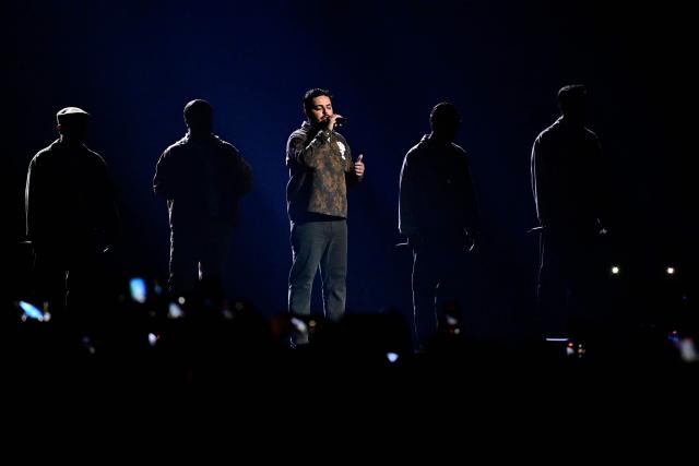 Portuguese singers Miguel Costa, Duarte Farias, Francisco Raposo, Luis Aleixo and Francisco Pestana of band Bandidos do Cante and representing Portugal with the song 'Rosa' perform during the first semi-final of the Eurovision Song Contest 2026 (ESC) at Wiener Stadthalle in Vienna, Austria on May 12, 2026. (Photo by Tobias SCHWARZ / AFP)