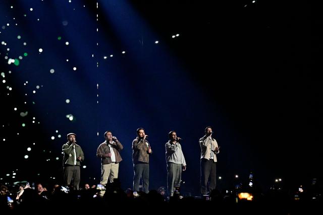 Portuguese singers Miguel Costa, Duarte Farias, Francisco Raposo, Luis Aleixo and Francisco Pestana of band Bandidos do Cante and representing Portugal with the song 'Rosa' perform during the first semi-final of the Eurovision Song Contest 2026 (ESC) at Wiener Stadthalle in Vienna, Austria on May 12, 2026. (Photo by Tobias SCHWARZ / AFP)