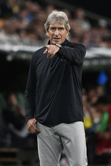 Real Betis' Chilean coach Manuel Pellegrini gestures on the touchline during the Spanish league football match between Real Betis and Elche CF at Benito Villamarin Stadium in Seville on May 12, 2026. (Photo by CRISTINA QUICLER / AFP)