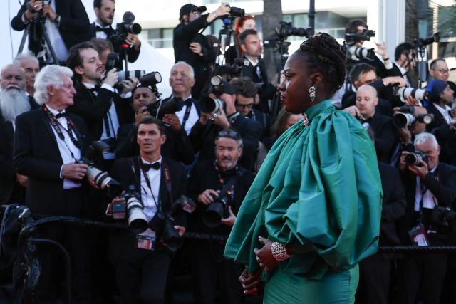 Member of the jury "Un Certain Regard" and Senegalese producer and director Angele Diabang arrives for the Opening Ceremony and the screening of the film "La Venus electrique" (The Electric Kiss) at the 79th edition of the Cannes Film Festival in Cannes, southern France, on May 12, 2026. (Photo by Sameer AL-DOUMY / AFP)