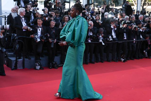 Member of the jury "Un Certain Regard" and Senegalese producer and director Angele Diabang arrives for the Opening Ceremony and the screening of the film "La Venus electrique" (The Electric Kiss) at the 79th edition of the Cannes Film Festival in Cannes, southern France, on May 12, 2026. (Photo by Sameer AL-DOUMY / AFP)