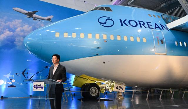 Walter Cho, Chairman and CEO of Korean Air and Hanjin Group, addresses attendees inside the Korean Air Aviation Gallery at the future Samuel Oschin Air and Space Center at the California Science Center in Los Angeles, California, on May 12, 2026, following the installation of the first artifacts in the aviation gallery. (Photo by Frederic J. BROWN / AFP)