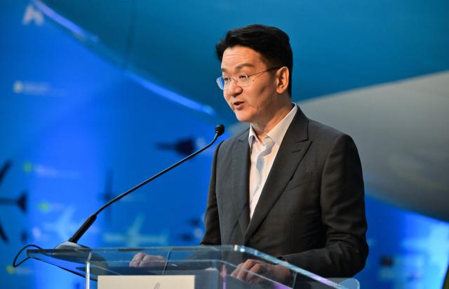 Walter Cho, Chairman and CEO of Korean Air and Hanjin Group, addresses attendees inside the Korean Air Aviation Gallery at the future Samuel Oschin Air and Space Center at the California Science Center in Los Angeles, California, on May 12, 2026, following the installation of the first artifacts in the aviation gallery. (Photo by Frederic J. BROWN / AFP)