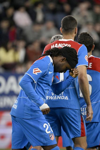 Atletico Madrid's English forward #22 Ademola Lookman celebrates scoring his team's first goal from the penalty spot during the Spanish league football match between CA Osasuna and Club Atletico de Madrid at El Sadar Stadium in Pamplona on May 12, 2026. (Photo by ANDER GILLENEA / AFP)