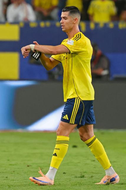 Nassr's Portuguese forward #07 Cristiano Ronaldo leaves he pitch during the Saudi Pro League football match between Al-Nassr and Al-Hilal at King Fahd Sports City Stadium in Riyadh on May 12, 2026. (Photo by Fayez NURELDINE / AFP)