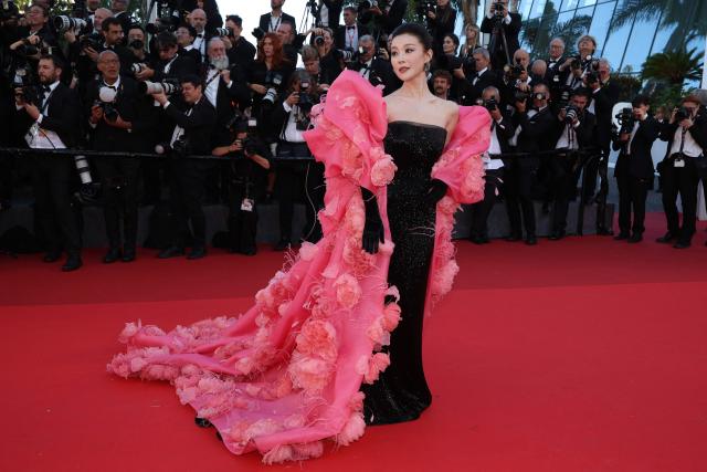 Chinese singer Chang Sisi arrives for the Opening Ceremony and the screening of the film "La Venus electrique" (The Electric Kiss) at the 79th edition of the Cannes Film Festival in Cannes, southern France, on May 12, 2026. (Photo by Valery HACHE / AFP)