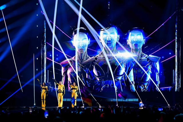 Georgian singers Giorgi Shiolashvili, Mariam Tatulashvili and Mariam Kikuashvili of band Bzikebi and representing Georgia with the song 'On Replay' perform during the first semi-final of the Eurovision Song Contest 2026 (ESC) at Wiener Stadthalle in Vienna, Austria on May 12, 2026. (Photo by Tobias SCHWARZ / AFP)