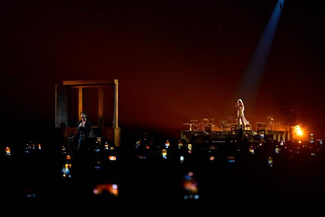 Finnish singers Linda Lampenius and Pete Parkkonen, representing Finland with the song 'Liekinheitin', perform during the first semi-final of the Eurovision Song Contest 2026 (ESC) at Wiener Stadthalle in Vienna, Austria on May 12, 2026. (Photo by Tobias SCHWARZ / AFP)