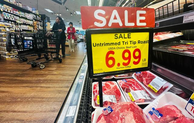 People shop in a supermarket in Alhambra, California on May 12, 2026. Consumer inflation in the United States hit a three-year high in April, with the economic fallout of US President Donald Trump's Iran war rippling through the world's largest economy. The consumer price index (CPI) rose 3.8 percent year-on-year, up from March's 3.3 percent figure, the US Bureau of Labor Statistics (BLS) said on Tuesday. (Photo by Frederic J. BROWN / AFP)