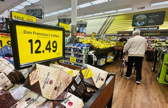 Coffee prices are displayed at a supermarket in Alhambra, California on May 12, 2026. Consumer inflation in the United States hit a three-year high in April, with the economic fallout of US President Donald Trump's Iran war rippling through the world's largest economy. The consumer price index (CPI) rose 3.8 percent year-on-year, up from March's 3.3 percent figure, the US Bureau of Labor Statistics (BLS) said on Tuesday. (Photo by Frederic J. BROWN / AFP)
