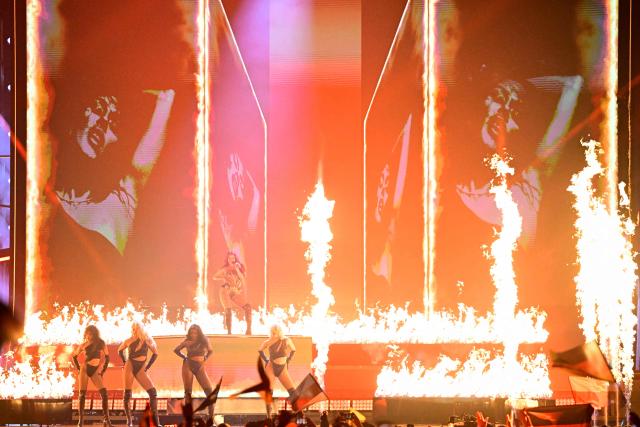 German singer Sarah Engels (back), representing Germany with the song 'Fire', performs during the first semi-final of the Eurovision Song Contest 2026 (ESC) at Wiener Stadthalle in Vienna, Austria on May 12, 2026. (Photo by Tobias SCHWARZ / AFP)
