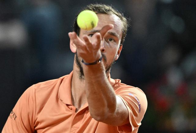 Russia's Daniil Medvedev serves to Argentina's Thiago Agustin Tirante during the ATP Rome Open tennis tournament at Foro Italico in Rome on May 12, 2026. (Photo by Tiziana FABI / AFP)