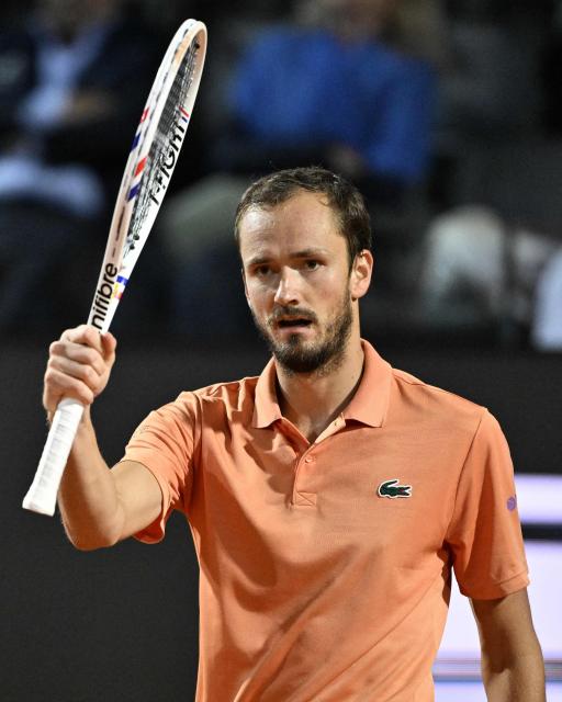 Russia's Daniil Medvedev reacts during the match against Argentina's Thiago Agustin Tirante in the ATP Rome Open tennis tournament at Foro Italico in Rome on May 12, 2026. (Photo by Tiziana FABI / AFP)