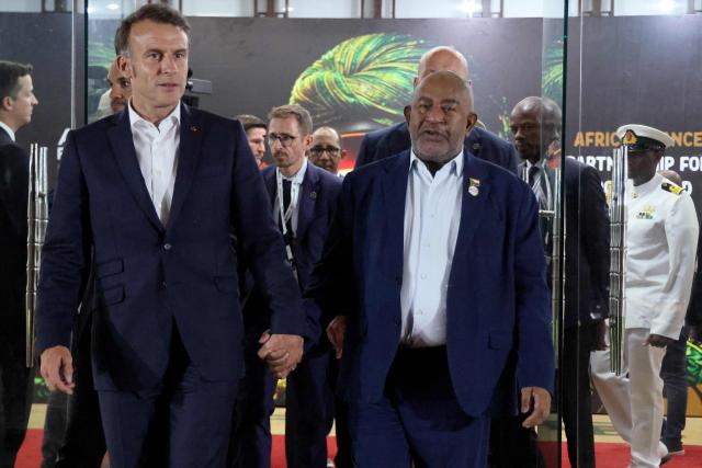 France's President Emmanuel Macron (L) walks with Comoros' President Assoumani Azali at the end of their bilateral meeting during the Africa Forward summit in Nairobi on May 12, 2026. (Photo by Ludovic MARIN / AFP)