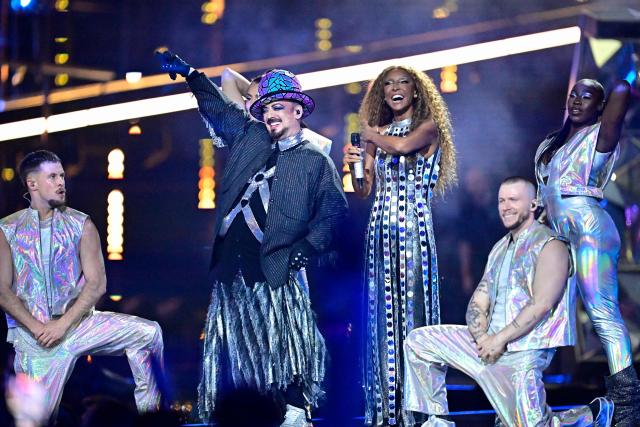 British musician Boy George (L) and Italian singer Senhit Zadik Zadik (R) aka Senhit and representing San Marino with the song 'Superstar" perform performs during the first semi-final of the Eurovision Song Contest 2026 (ESC) at Wiener Stadthalle in Vienna, Austria on May 12, 2026. (Photo by Tobias SCHWARZ / AFP)