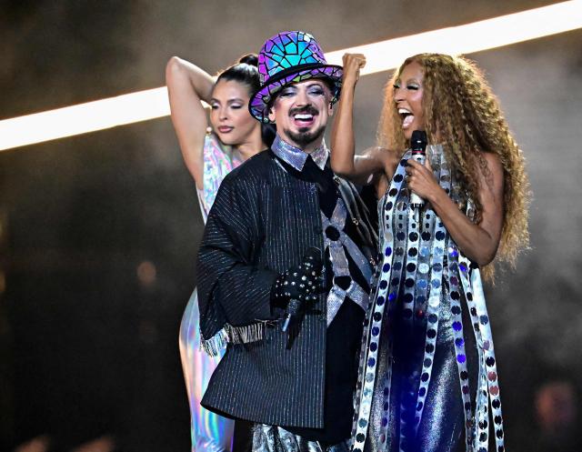 British musician Boy George (L) and Italian singer Senhit Zadik Zadik (R) aka Senhit and representing San Marino with the song 'Superstar" perform performs during the first semi-final of the Eurovision Song Contest 2026 (ESC) at Wiener Stadthalle in Vienna, Austria on May 12, 2026. (Photo by Tobias SCHWARZ / AFP)