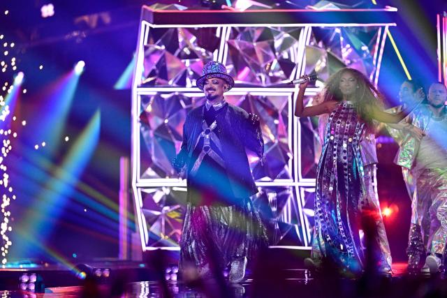 British musician Boy George (L) and Italian singer Senhit Zadik Zadik (R) aka Senhit and representing San Marino with the song 'Superstar" perform performs during the first semi-final of the Eurovision Song Contest 2026 (ESC) at Wiener Stadthalle in Vienna, Austria on May 12, 2026. (Photo by Tobias SCHWARZ / AFP)