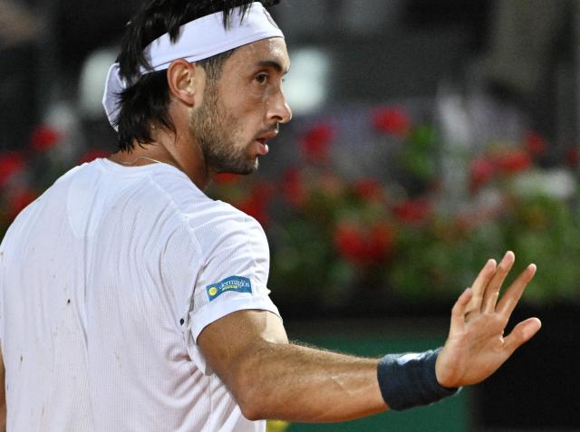 Argentina's Thiago Agustin Tirante reacts during the match against Russia's Daniil Medvedev in the ATP Rome Open tennis tournament at Foro Italico in Rome on May 12, 2026. (Photo by Tiziana FABI / AFP)