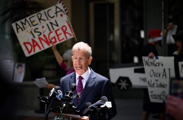 Attorney Marc Toberoff, representing Elon Musk, speaks during a press conference outside the federal courthouse during proceedings in the trial over his lawsuit against OpenAI in Oakland, California, on May 12, 2026. Musk, the founder of Tesla and SpaceX, alleges that Altman and co-founder Greg Brockman misappropriated his $38 million donations when OpenAI abandoned its original nonprofit and philanthropic mission to become the for-profit giant behind ChatGPT. (Photo by JOSH EDELSON / AFP)