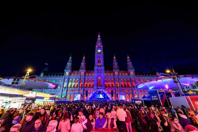 Spectators gather at the fan area at City Hall Square (Rathausplatz) during the first semi-final of the Eurovision Song Contest (ESC) in Vienna, Austria on May 12, 2026. (Photo by MAX SLOVENCIK / APA / AFP) / Austria OUT